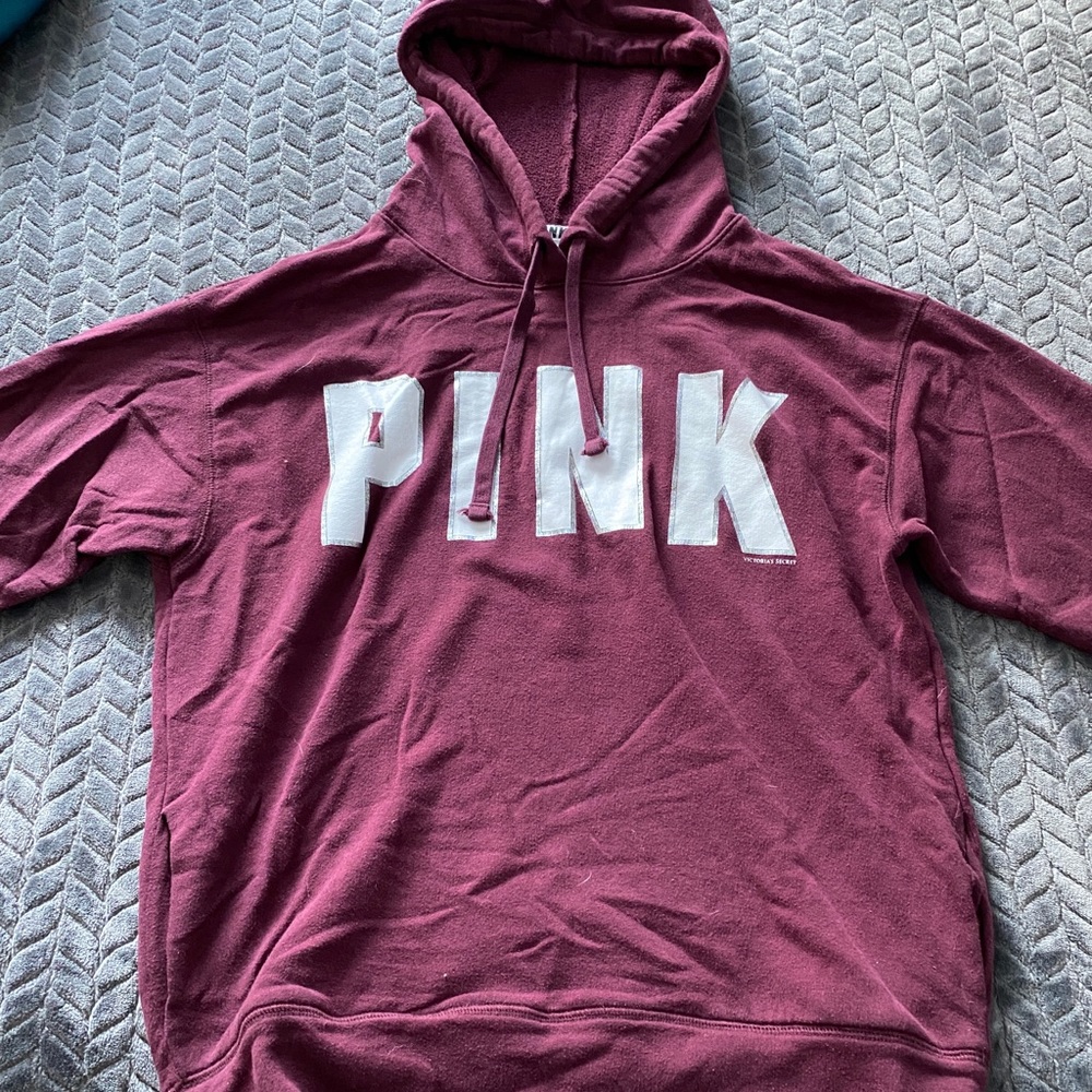 PINK maroon sweatshirt.
